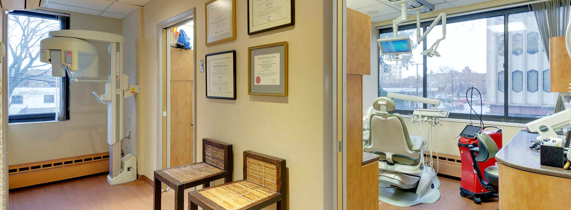 The image shows a modern dental clinic interior with various pieces of equipment, including a dental chair and an X-ray machine.